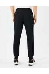 Skechers M Micro Coll. Side Zipper Jogger Fit Pant Erkek Eşofman Altı Siyah S211809-3817